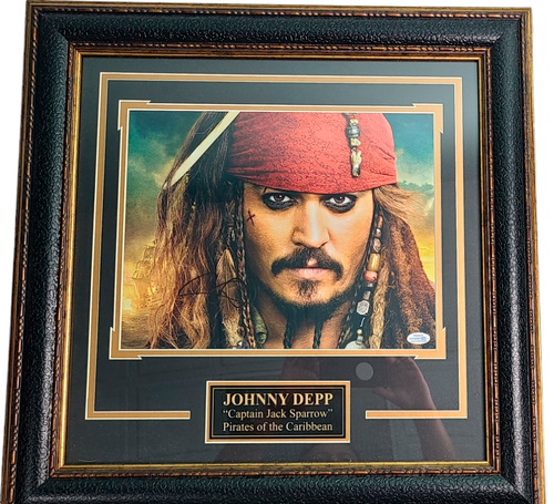Johnny Depp Autographed Framed Metalic Pirates of The Caribbean Photo
