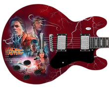 Load image into Gallery viewer, Michael J. Fox Autographed Back To The Future Photo Graphics Guitar
