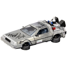 Load image into Gallery viewer, Michael J. Fox Christopher Lloyd Signed Back to the Future 1:24 DeLorean Car
