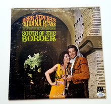 Load image into Gallery viewer, Herb Alpert Autographed South Of The Border Album Cover LP ACOA
